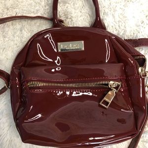 Mini red shinny leather backpack